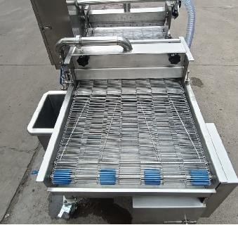 Automatische Fischschlagmaschine und -breitmaschine für die thermische Verarbeitung in der Lebensmittelindustrie